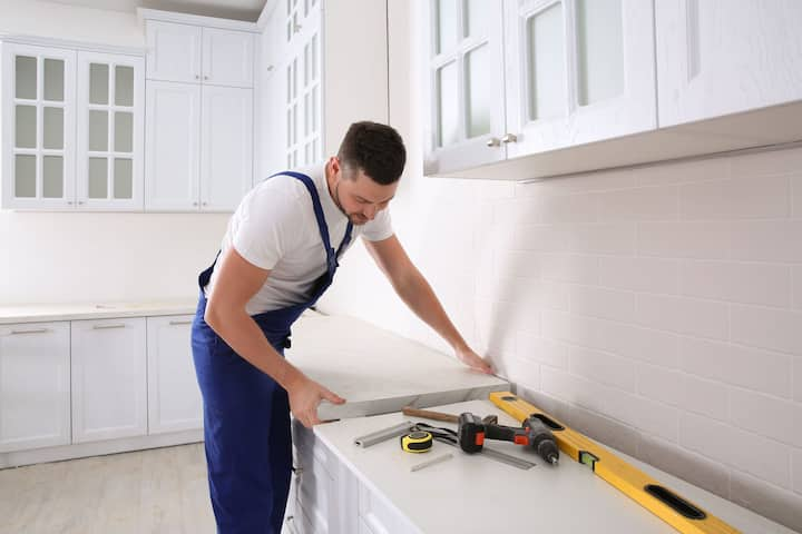 A kitchen countertop made of a durable and stain-resistant material, designed for easy maintenance in Spring Hill